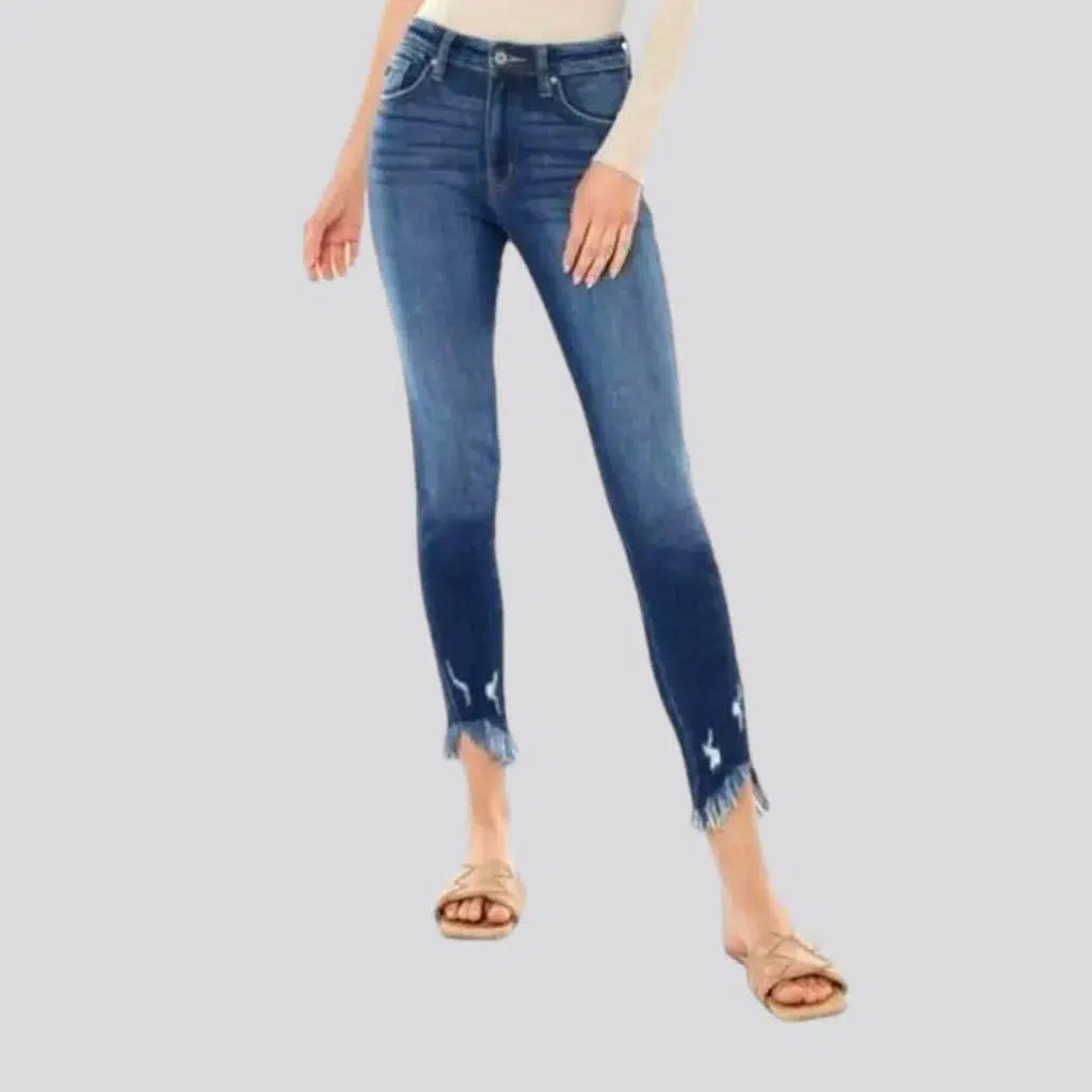 Distressed Jeans for Edgy Style -Medium-wash skinny jeans
 for ladies