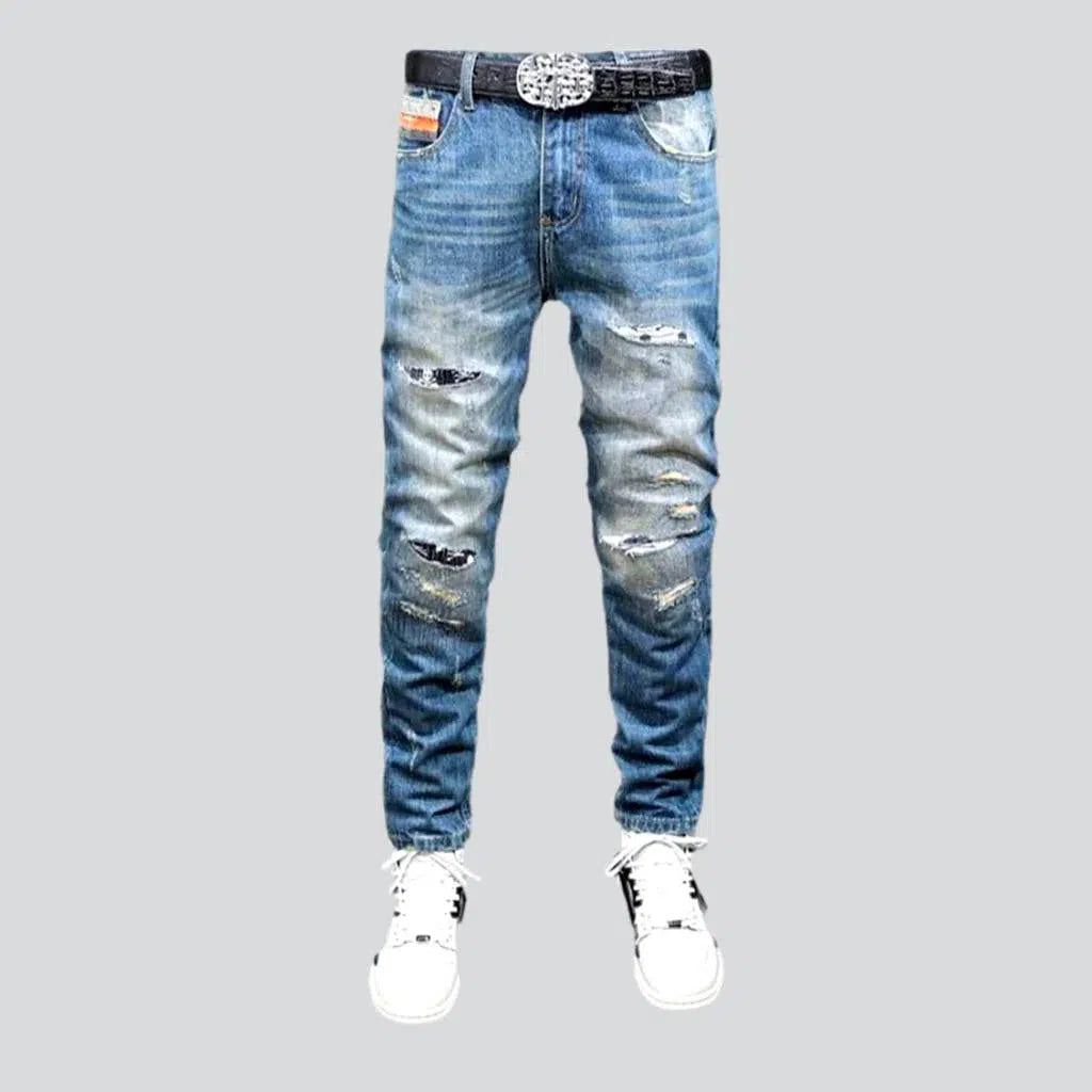 Cuffed Jeans for Stylish Touch -Small skulls embroidery jeans
 for men