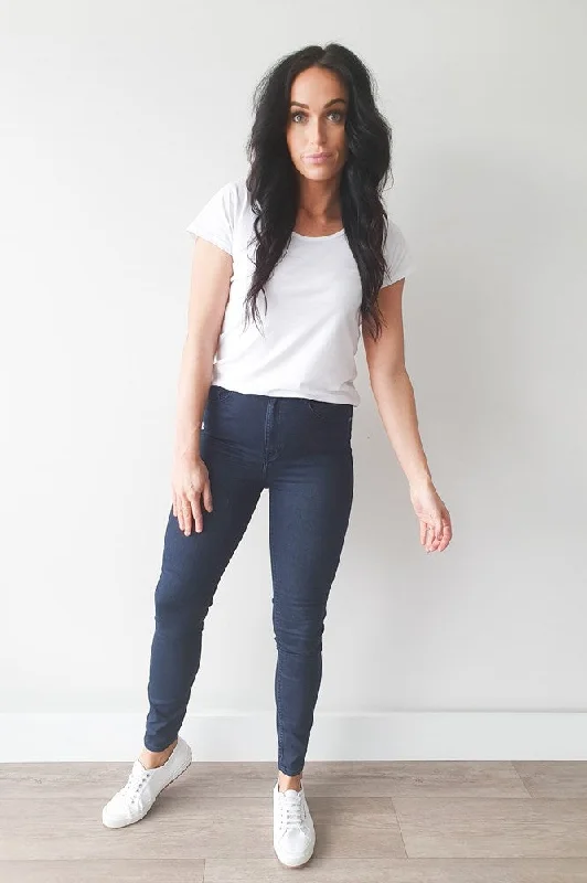 Vintage-inspired tight trousers for women with buttoned waist and retro charm -Silent Theory Bella Jean Indigo