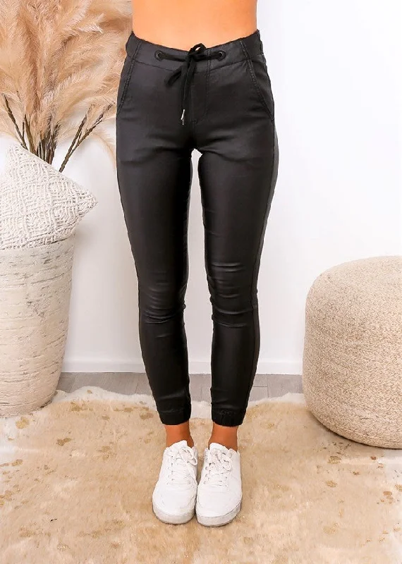 Elegant tight trousers for women with sleek design and tailored for a perfect fit -Leoni Hayden Wetlook Joggers Black